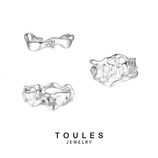 TOULES _Wave pattern openwork shaped ring